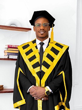 Ambassador Daniel Dela (Ph.D.) - Executive President